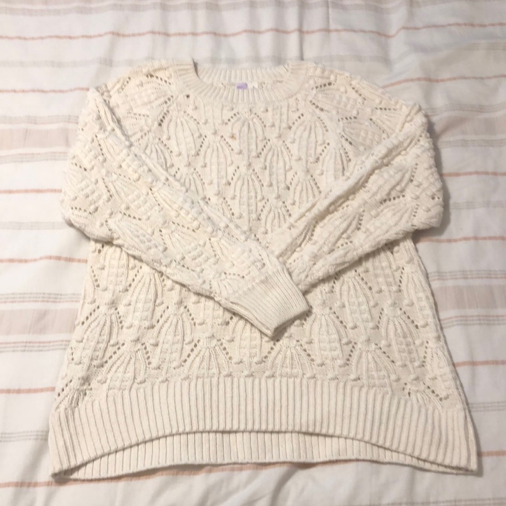 Knitted cream color sweater